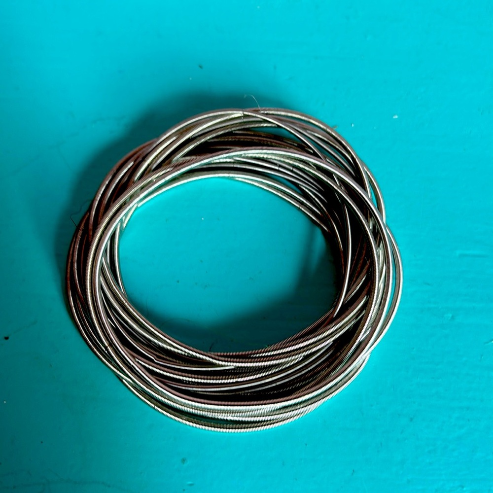 Women guitar strings bracelets . Listing is for 20 guitar strings bracelets